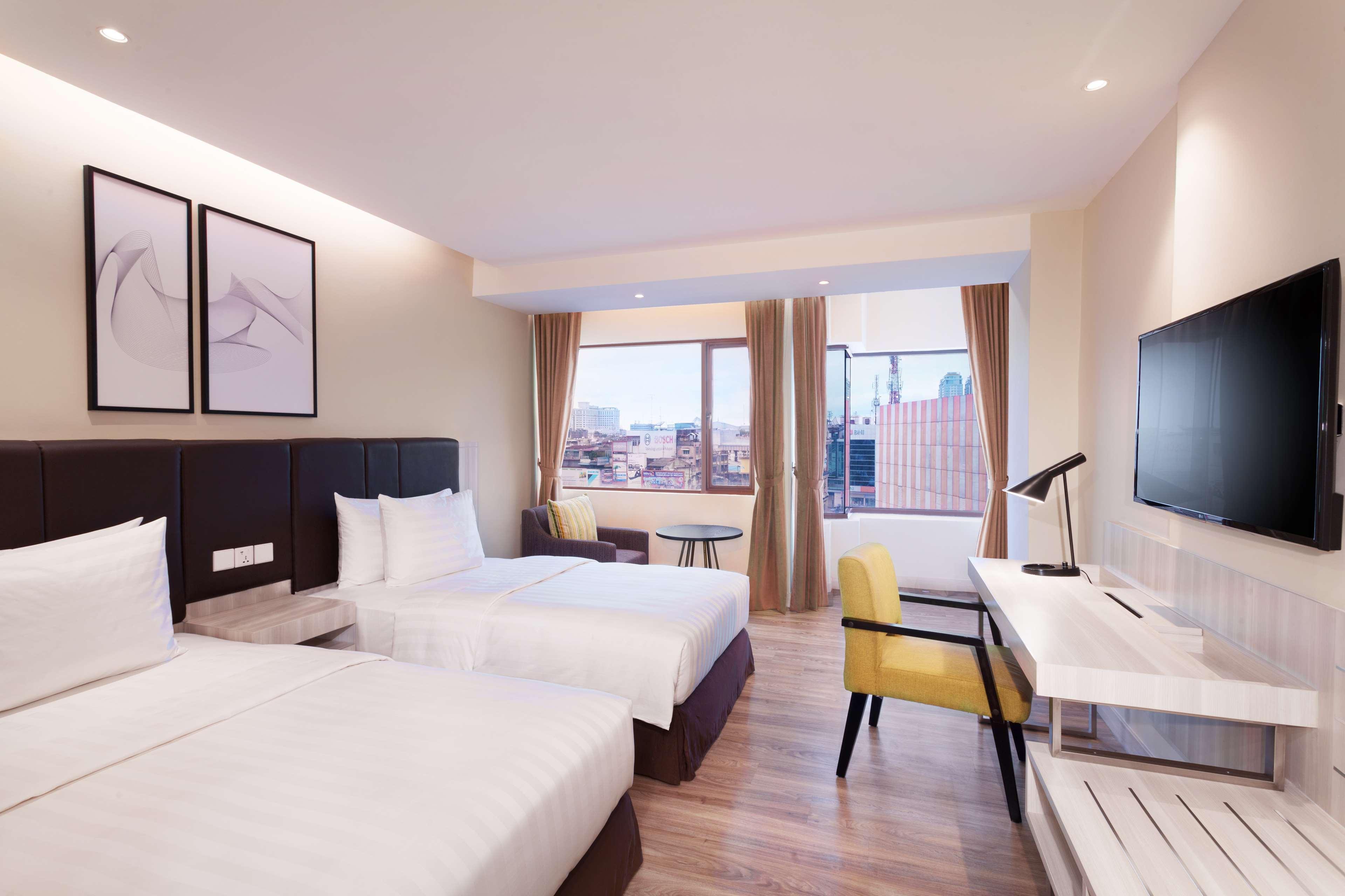 Aiho Hotel Medan Værelse billede